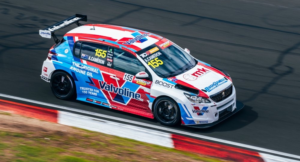 aaron cameron's supercar racing around the track