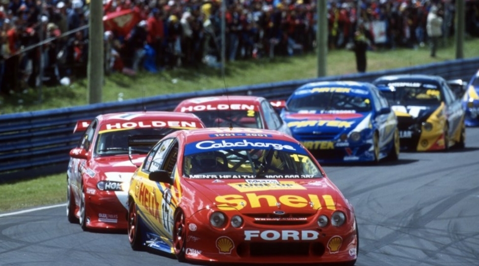 cars driving on the race track at queensland raceway