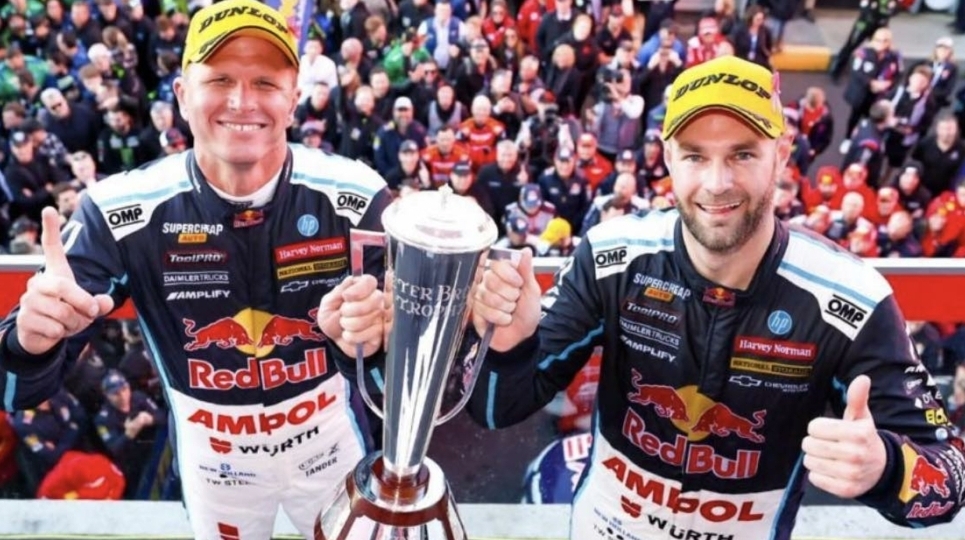 Shane van Gisgergen and Garth Tander celebrate their Bathurst win